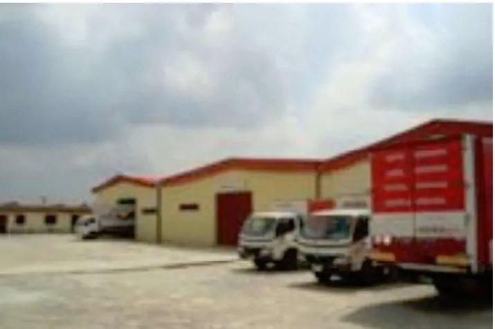 Taka Square furniture factory with delivery trucks